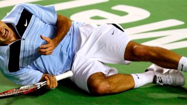 Federer celebra su victoria en la final del Abierto de Australia