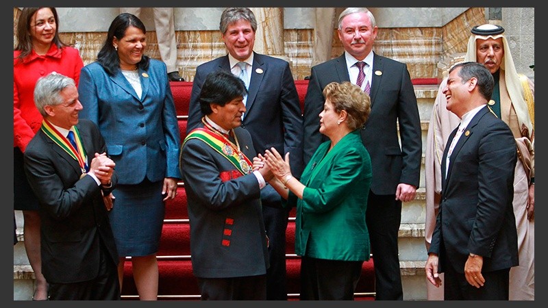El vicepresidente Amado Boudou, detrás de Evo Morales, representó a la Argentina.