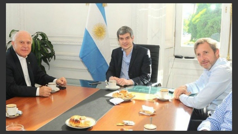 El gobernador junto a Peña y Frigerio en la Casa Rosada.