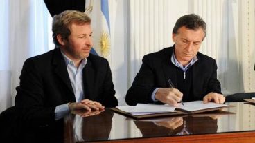 Frigerio junto al presidente Macri.