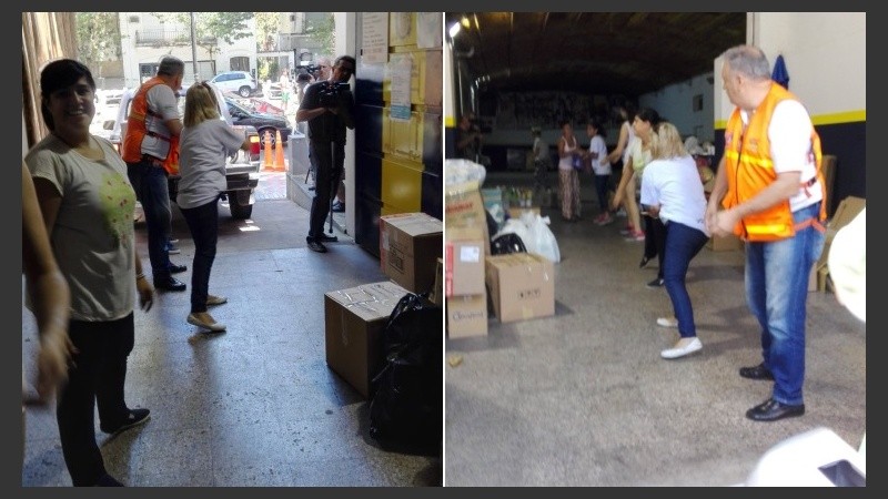 Colaboradores cargando el camión con donaciones. 