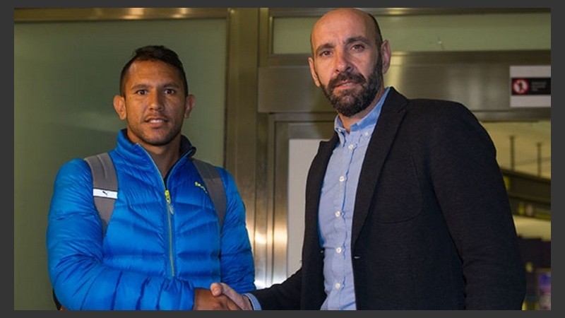 Montoya con Monchi, director deportivo de Sevilla.