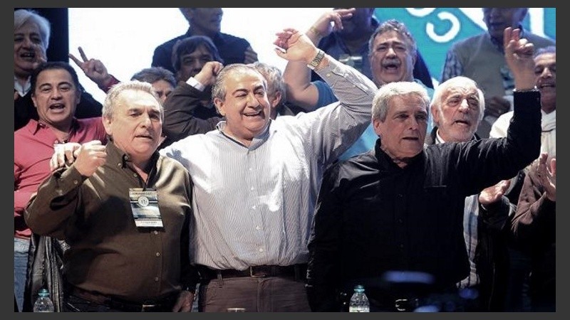 Acuña, junto a Daer y Schmidt, en el triunvirato de la CGT.