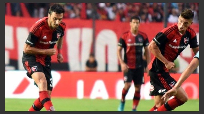 Scocco, Amoroso y Domínguez en escena.