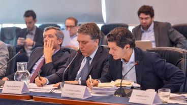 Laspina junto al ministro Nicolás Dujovne en el Congreso.