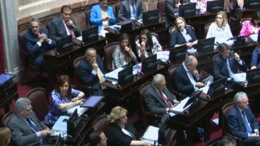 Reutemann detrás de Cristina.