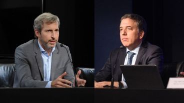 Frigerio y Dujovne, los ministros que buscan acordar con los gobernadores.