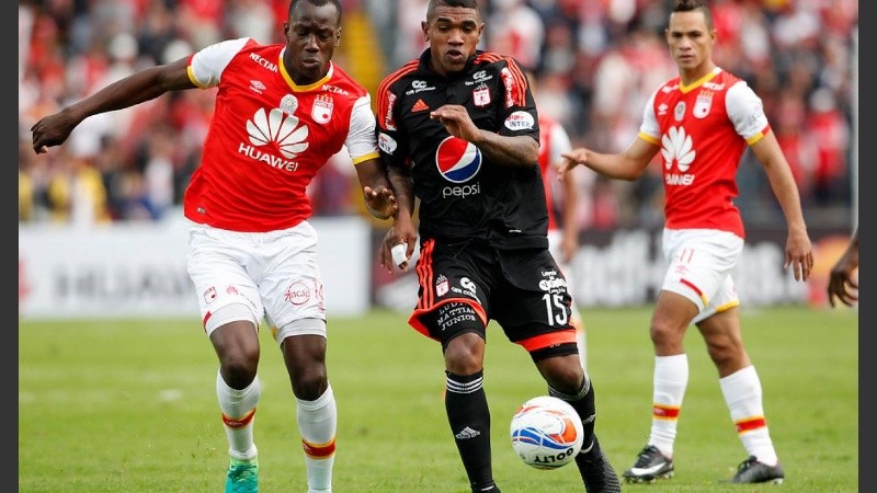 Blanco, a la derecha y con la casaca del América de Cali.