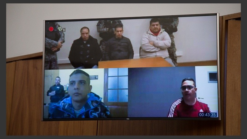 Los acusados participan de la audiencia de apelación por videoconferencia. 
