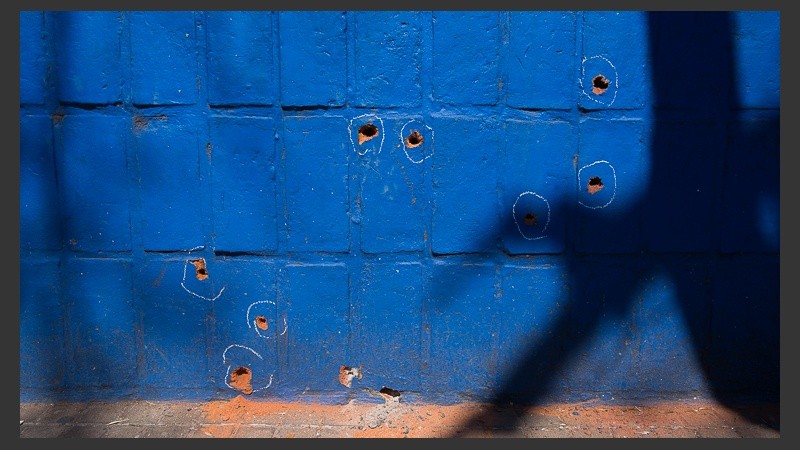 Los balazos en el frente del comercio. 