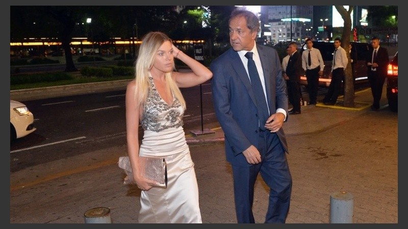 Scioli y Berger, cuando eran pareja ingresando a un evento.