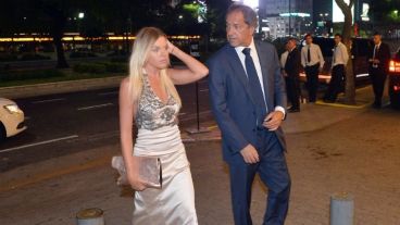 Scioli y Berger, cuando eran pareja ingresando a un evento.