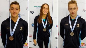 Máximo Concetti, Chiara Medum y Joaquín Renzi, destacados en natación.