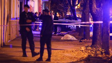 La Policía de Investigaciones este viernes a la noche en el lugar del crimen.