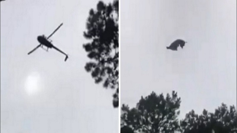 El helicóptero sobrevolando la pileta sobre la cual arrojaron el animal.