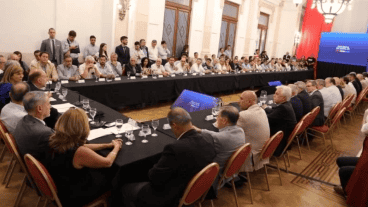 Hombres. La reunión en la Casa Gris tuvo escasa presencia femenina.