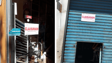 Las dos fajas de clausura en los negocios rosarinos.