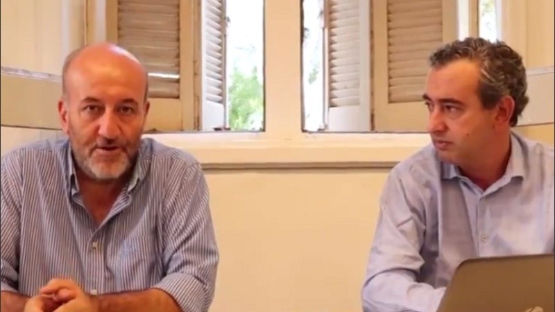 El intendente Pablo Javkin, y el secretario de Salud, Leonardo Caruana. 