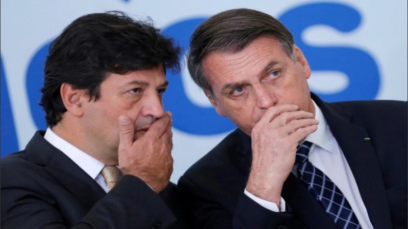 Luiz Henrique Mandetta y Jair Bolsonaro.