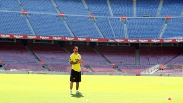 Messi posteó imágenes en el césped del Camp Nou.