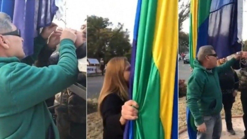 Suma tensión causaron dos personas al intentar bajar la bandera de la diversidad en Córdoba. 