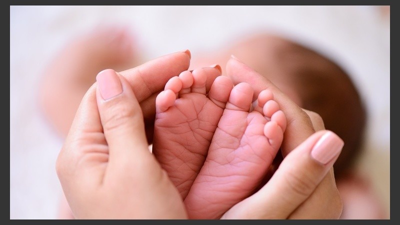 tiny foot of newborn baby