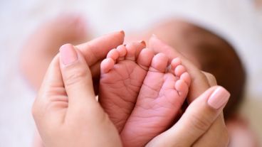 tiny foot of newborn baby