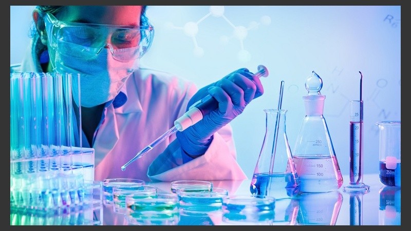 Chemistry Laboratory - Woman With Pipettes And Test Tubes