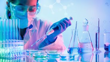 Chemistry Laboratory - Woman With Pipettes And Test Tubes