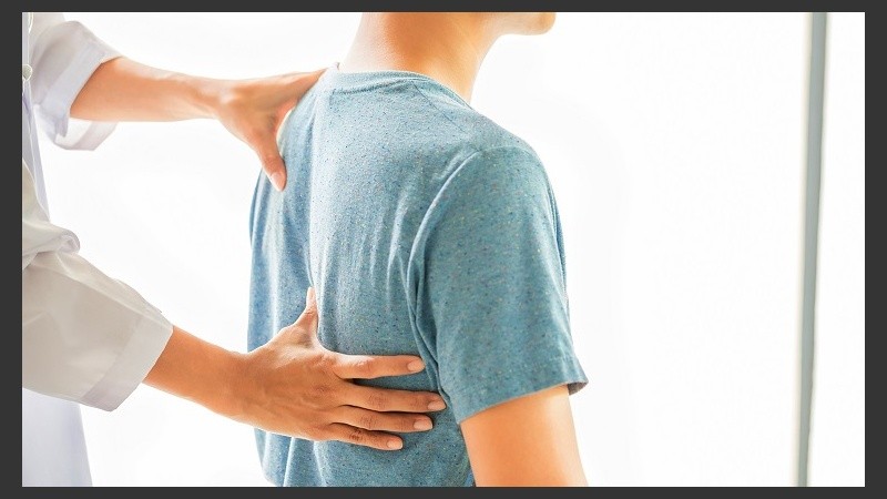 Close up of Physiotherapist working with patient in clinic