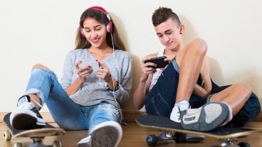 Girl and boy playing games online