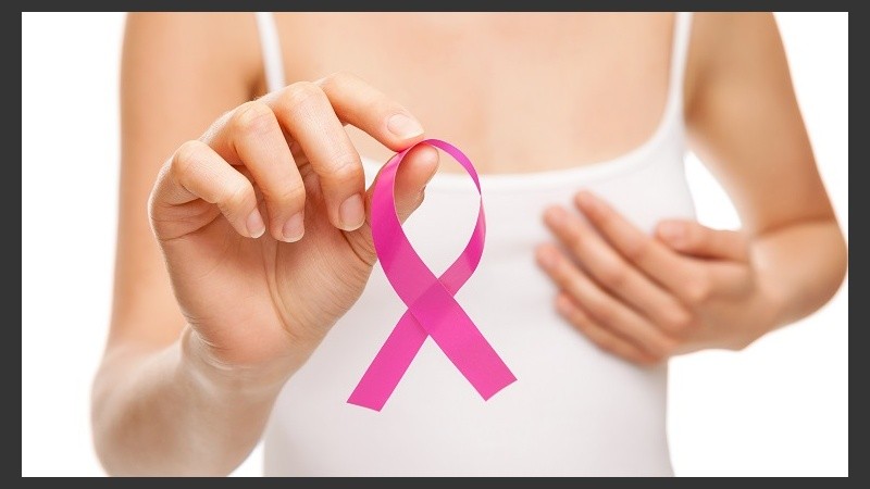 Woman with breast cancer awareness ribbon