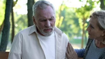 Senior Man Feeling Unwell, Dizziness And Weakness, Scared Wife Supports Husband