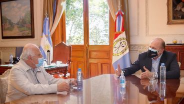 Perotti y Lifschitz sentados a la mesa del diálogo.