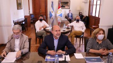 Perotti junto a sus ministro Agosto y Martorano.