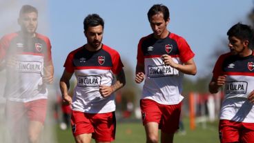 Ignacio Scocco y Mariano Bíttolo, dos de los tocados en el partido ante Godoy Cruz.