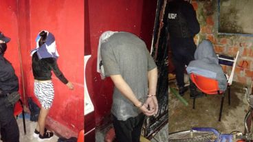 Los dos hombres y la mujer detenidos tras el crimen.