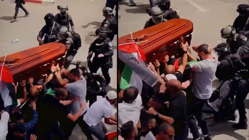 La Policía Israelí ataca a los palestinos que llevan el ataúd de la periodista Abu Aqleh.