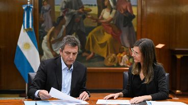 Massa con Raverta para el anuncio.