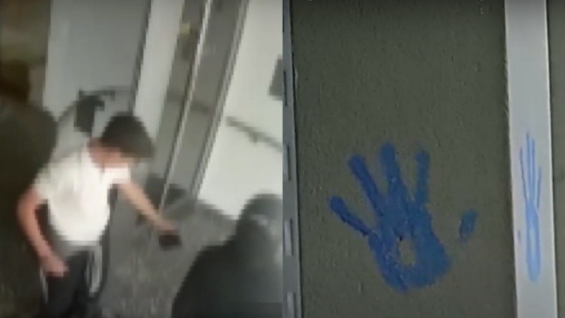 La imagen del momento del robo en la puerta del edificio y de las manos azules marcadas en las paredes, motivo de sospecha de los vecinos.