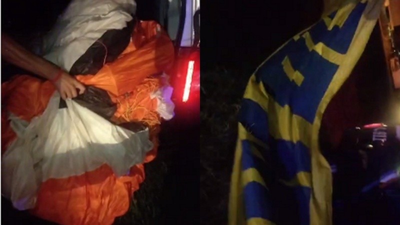 El parapente y la bandera secuestrados en un Berlingo en Baigorria en la noche de este domingo.