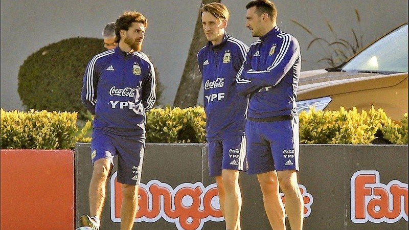 Matías Manna, junto a Pablo Aimar y Lionel Scaloni.