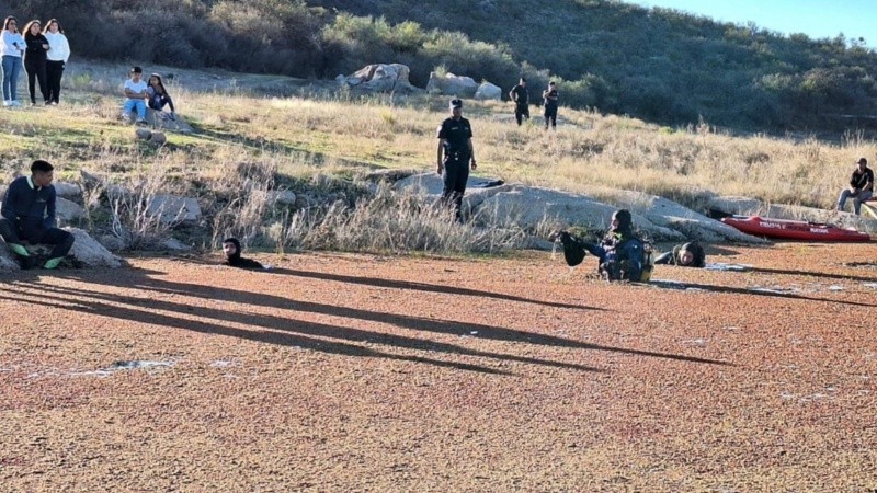 Los cuerpos de las víctimas estaban sumergidos en el dique El Cajón.