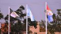 La bandera del departamento General López flameando con la argentina y la santafesina.