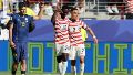 Los locales abrieron el partido (EFE).