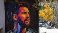 Mural de Mesi de Pelu Rodríguez (izq) y Maximiliano Pullaro (der).