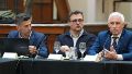 El secretario Cristian Chuna, a la derecha, en la presentación de la Expo Seguridad.